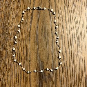 Women’s silver necklace with grayish-white beads. 16” in length. Fashion jewelry